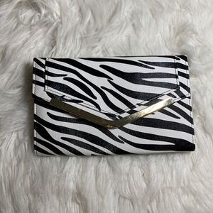 Avenue 9 zebra print clutch.  See photos for complete description/details.